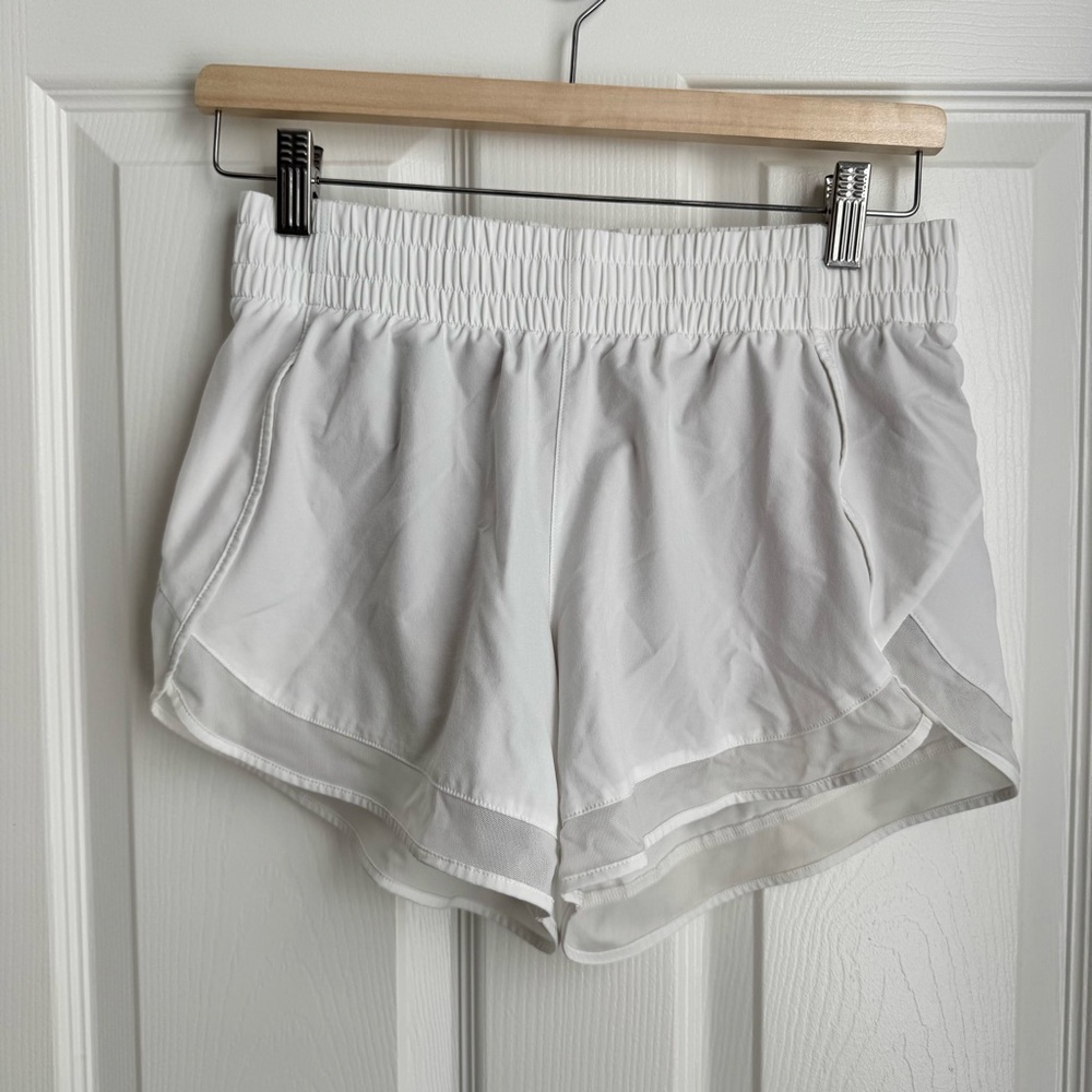 ATHLETA mesh 4” racer shorts size XS